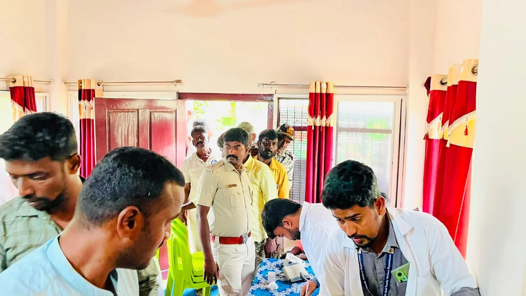 Indoor clinical triage and blood pressure screening conducted by certified medical staff.